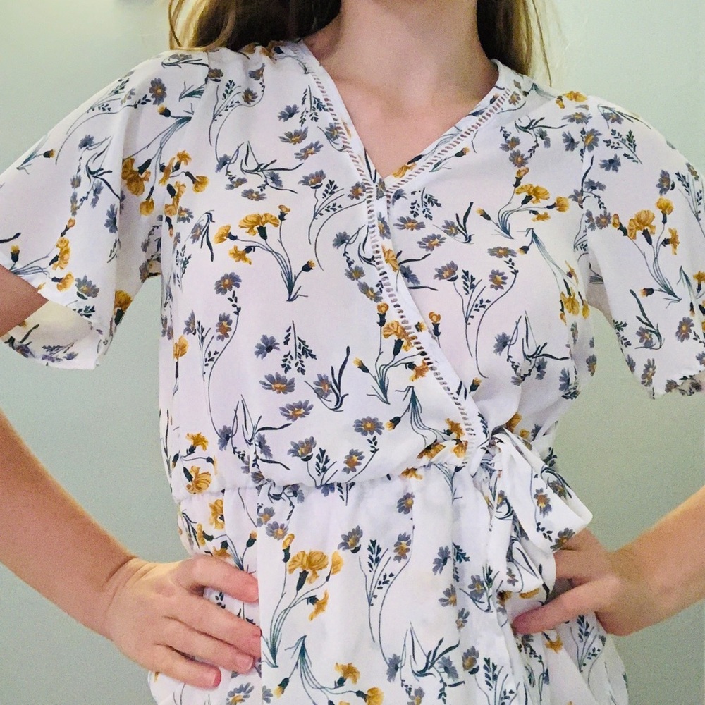 White blouse with floral detail